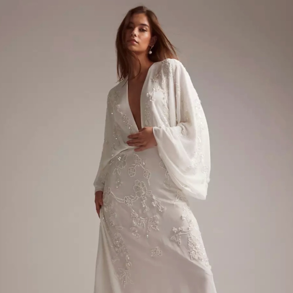 Lisa drape sleeve plunge wedding dress with floral embellishment in ivory